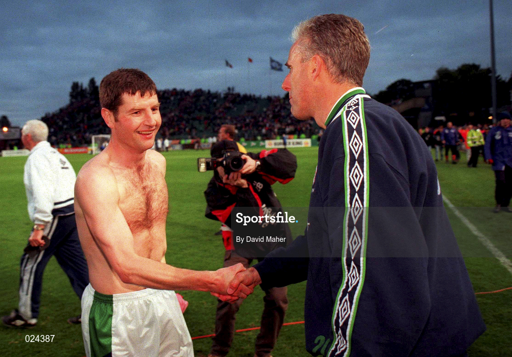 9 June 1999; Republic of Ireland manager Mick McCarthy shakes hands with Denis Irwin following the UEFA European Championships Qualifier match between Republic of Ireland and FYR Macedonia at Lansdowne Road in Dublin. Photo by David Maher/Sportsfile