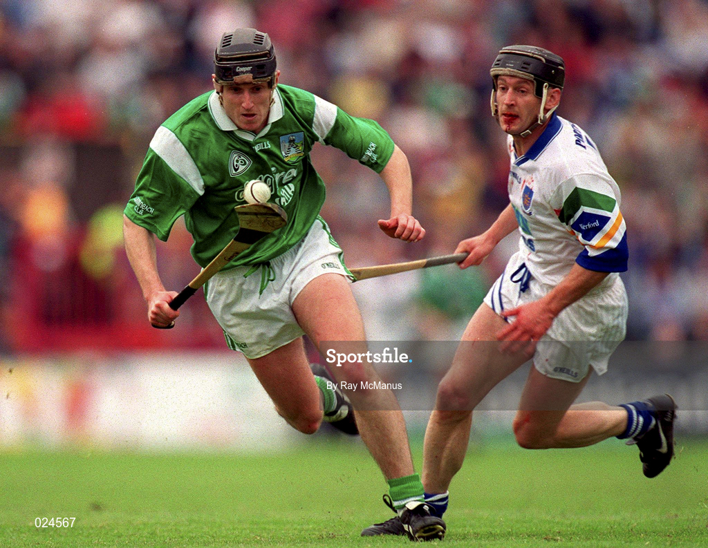 30 May 1999; Jack Foley of Limerick in action against Billy O'Sullivan of Waterford during the Guinness Munster Senior Hurling Championship quarter-final match between Limerick and Waterford at Páirc Uí Chaoimh in Cork. Photo by Ray McManus/Sportsfile