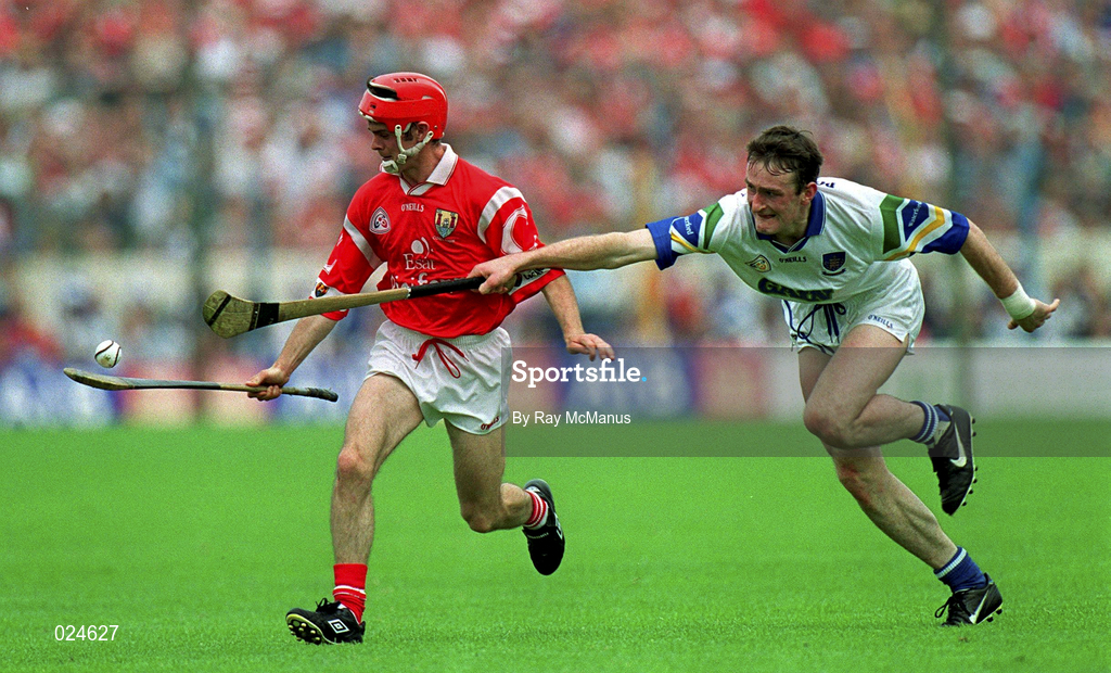 13 June 1999; Sean McGrath of Cork in action against Tom Feeney of Waterford during the Guinness Munster Senior Hurling Championship semi-final match between Cork and Waterford at Semple Stadium in Thurles, Tipperary. Photo by Ray McManus/Sportsfile