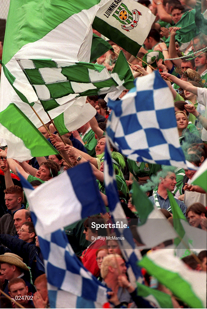 30 May 1999; Supporters wave flags ahead of the Guinness Munster Senior Hurling Championship quarter-final match between Limerick and Waterford at Páirc Uí Chaoimh in Cork. Photo by Ray McManus/Sportsfile