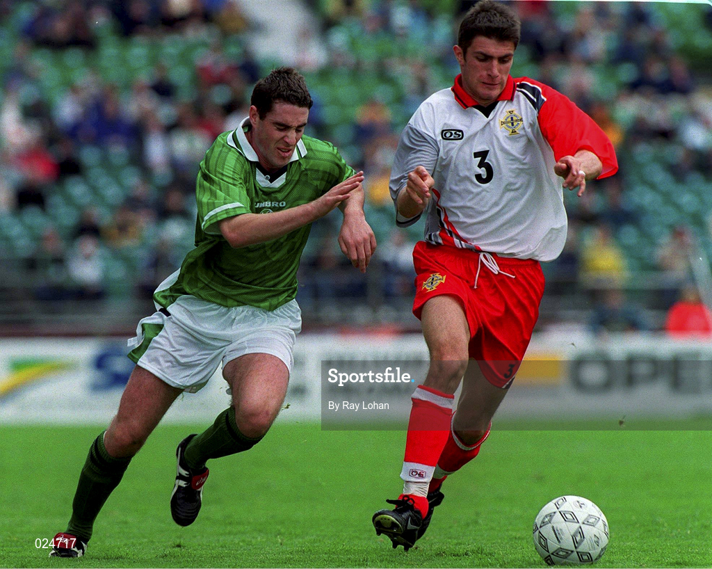 29 May 1999; Mark Kennedy of Republic of Ireland in action against Aaron Hughes of Northern Ireland during the international friendly match between Republic of Ireland and Northern Ireland at Lansdowne Road in Dublin. Photo by Ray Lohan/Sportsfile