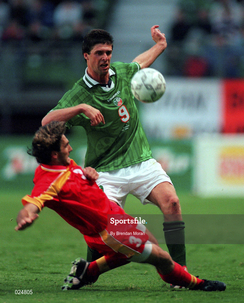 9 June 1999; Niall Quinn of Republic of Ireland in action against Goran Stavrevski of FYR Macedonia during the UEFA European Championships Qualifier match between Republic of Ireland and FYR Macedonia at Lansdowne Road in Dublin. Photo by Brendan Moran/Sportsfile
