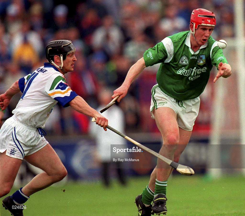 30 May 1999; Ollie Moran of Limerick in action against Billy O'Sullivan of Waterford during the Guinness Munster Senior Hurling Championship quarter-final match between Limerick and Waterford at Páirc Uí Chaoimh in Cork. Photo by Ray McManus/Sportsfile