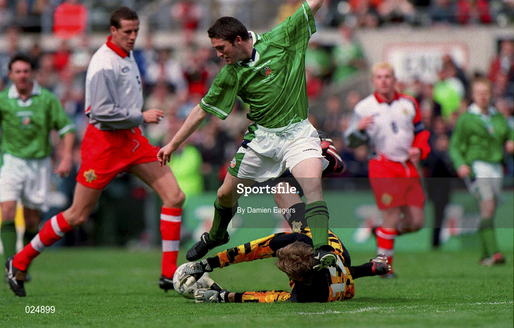 29 May 1999; Northern Ireland goalkeeper Roy Carroll makes a save from Robbie Keane of Republic of Ireland during the international friendly match between Republic of Ireland and Northern Ireland at Lansdowne Road in Dublin. Photo by Damien Eagers/Sportsfile