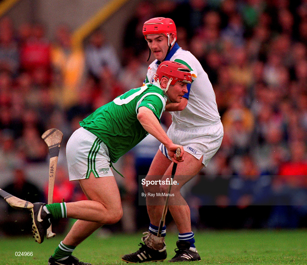 30 May 1999; TJ Ryan of Limerick in action against Stephen Frampton of Waterford during the Guinness Munster Senior Hurling Championship quarter-final match between Limerick and Waterford at Páirc Uí Chaoimh in Cork. Photo by Ray McManus/Sportsfile