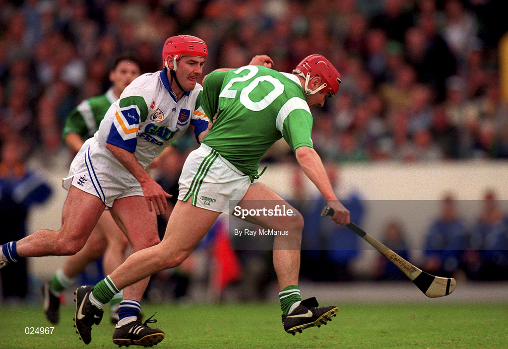 30 May 1999; TJ Ryan of Limerick in action against Stephen Frampton of Waterford during the Guinness Munster Senior Hurling Championship quarter-final match between Limerick and Waterford at Páirc Uí Chaoimh in Cork. Photo by Ray McManus/Sportsfile