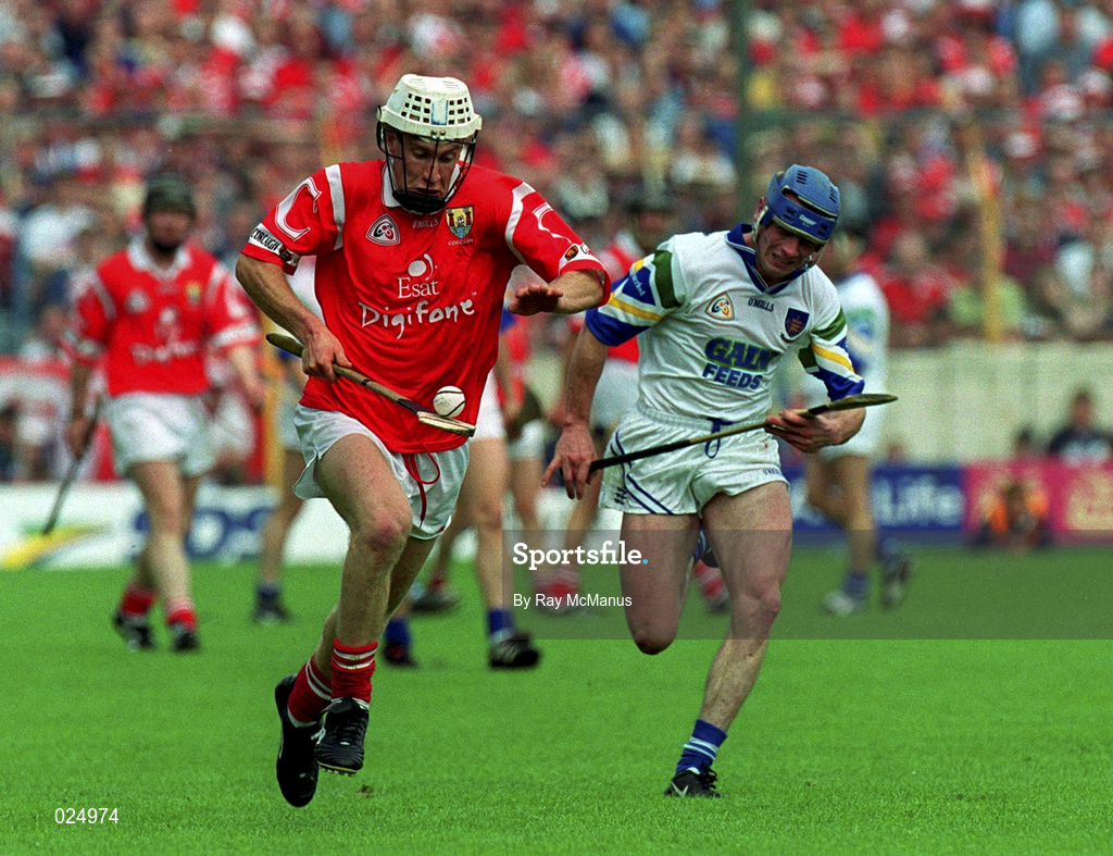 13 June 1999; Timmy McCarthy of Cork in action against Brian Greene of Waterford during the Guinness Munster Senior Hurling Championship semi-final match between Cork and Waterford at Semple Stadium in Thurles, Tipperary. Photo by Ray McManus/Sportsfile