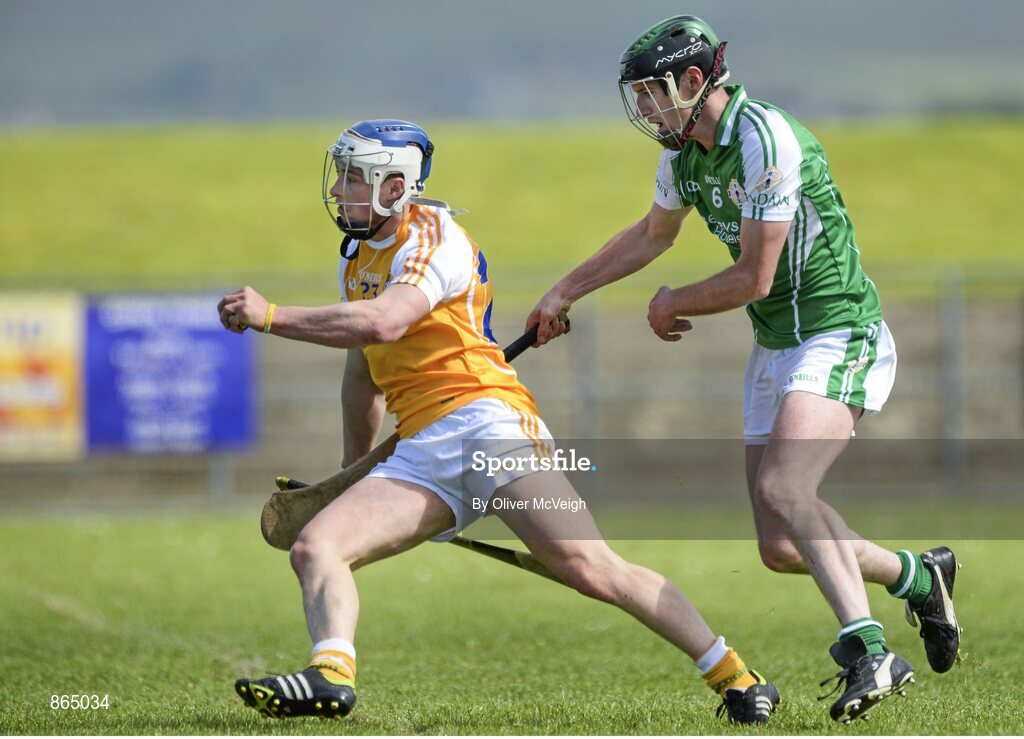 11 May 2014; Conor Johnston, Antrim, in action against PJ Rowe, London. GAA All-Ireland Senior Hurling Championship Qualifier Group, Round 3, Antrim v London, Ballycastle, Co. Antrim. Picture credit: Oliver McVeigh / SPORTSFILE