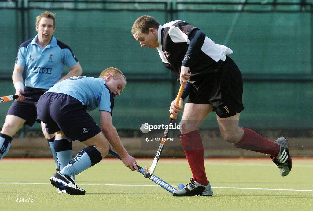 19 March 2006; Paul Lombard, Cork Harlequins, in action against Ian Davidson, Lisnagarvey. Irish Men's Senior Cup Final, Cork Harlequins v Lisnagarvey, Belfield, UCD, Dublin. Picture credit: Ciara Lyster / SPORTSFILE