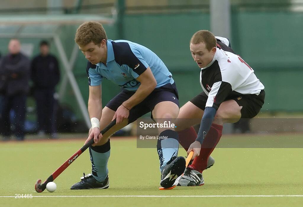 19 March 2006; Mark Robinson, Lisnagarvey, in action against Paul Lombard, Cork Harlequins. Irish Men's Senior Cup Final, Cork Harlequins v Lisnagarvey, Belfield, UCD, Dublin. Picture credit: Ciara Lyster / SPORTSFILE