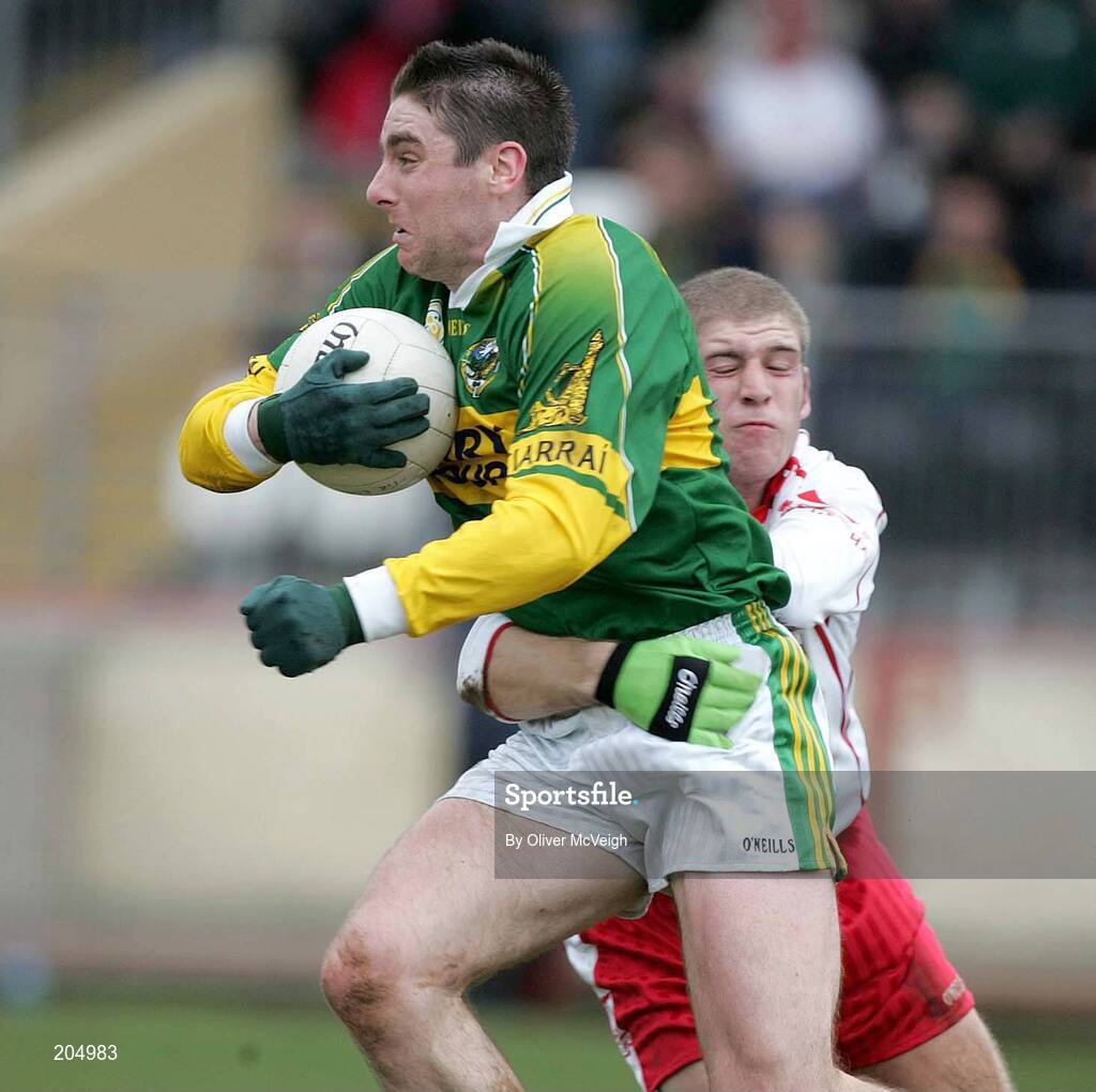 26 March 2006; Kerry's Darragh O Se is tackled by Tyrone's Kevin Hughes. Allianz National Football League, Division 1A, Round 6, Tyrone v Kerry, Healy Park, Omagh, Co. Tyrone. Picture credit: Oliver McVeigh / SPORTSFILE