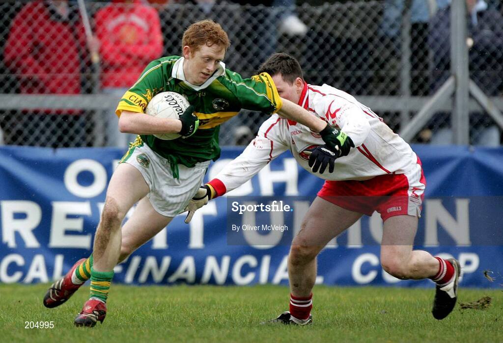 26 March 2006; Colm Cooper, Kerry, is tackled by Conor Gormley, Tyrone. Allianz National Football League, Division 1A, Round 6, Tyrone v Kerry, Healy Park, Omagh, Co. Tyrone. Picture credit: Oliver McVeigh / SPORTSFILE