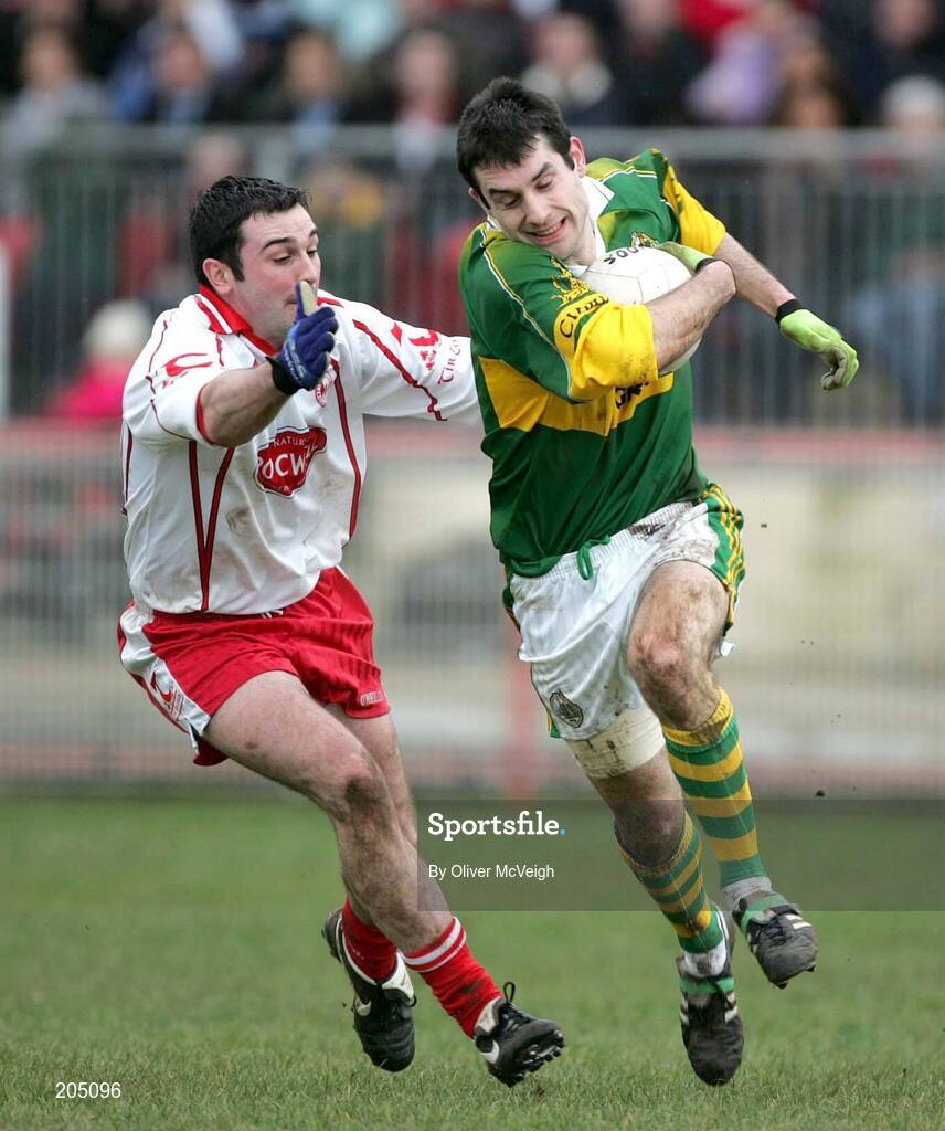 26 March 2006; Tom O'Sullivan, Kerry, is tackled by Ryan Mellon, Tyrone. Allianz National Football League, Division 1A, Round 6, Tyrone v Kerry, Healy Park, Omagh, Co. Tyrone. Picture credit: Oliver McVeigh / SPORTSFILE