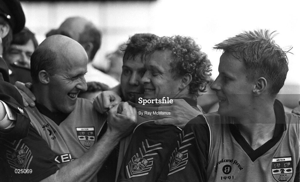 15 September 1991; Down players, from left, Ambrose Rodgers, D.J. Kane and Barry Breen celebrate following the All-Ireland Senior Football Championship Final match between Down and Meath at Croke Park in Dublin. Photo by Ray McManus/Sportsfile
