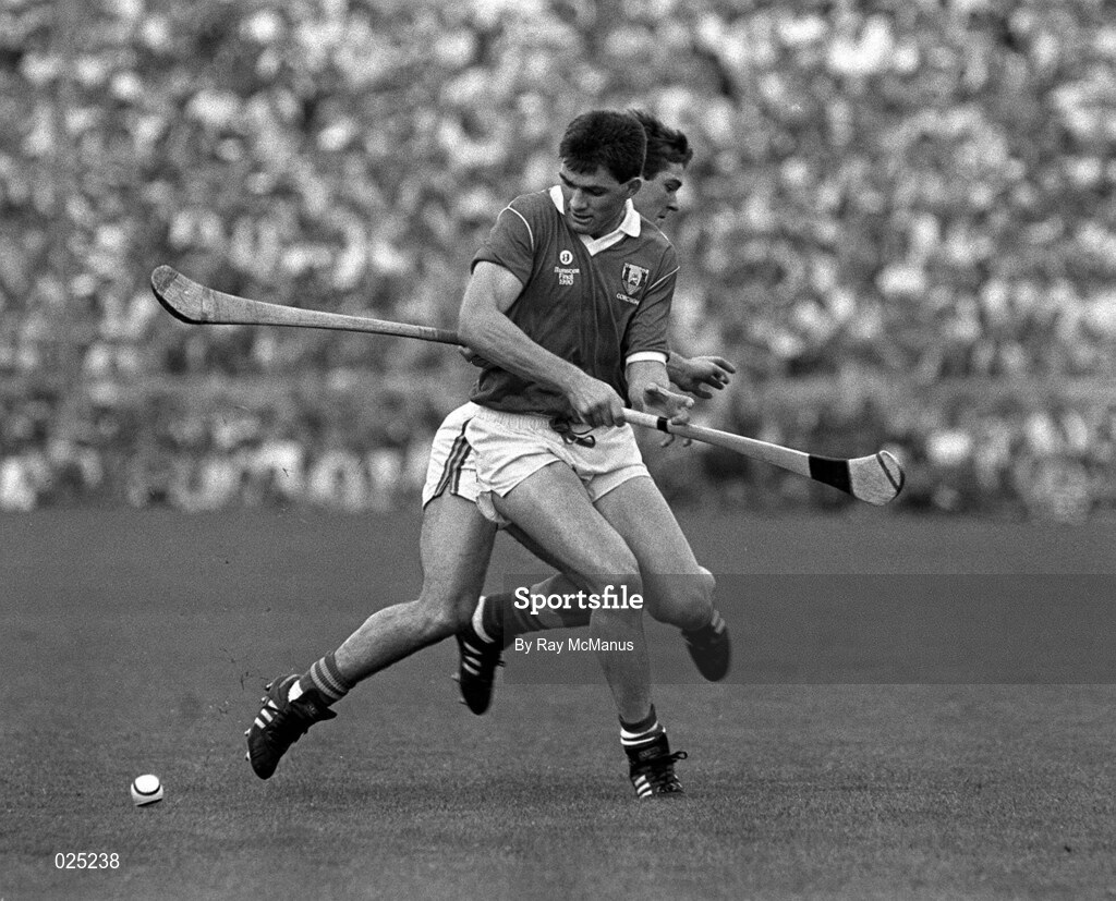 16 July 1990; Pat Buckley of Cork in action against John Kennedy of Tipperary during the Munster Senior Hurling Championship Final match between Tipperary and Cork at Semple Stadium in Thurles, Tipperary. Photo by Ray McManus/Sportsfile
