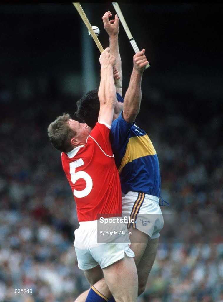 16 July 1990. Sean McCarthy of Cork in action against Joe Hayes of Tipperary during the Munster Senior Hurling Championship Final match between Tipperary and Cork at Semple Stadium in Thurles, Tipperary. Photo by Ray McManus/Sportsfile