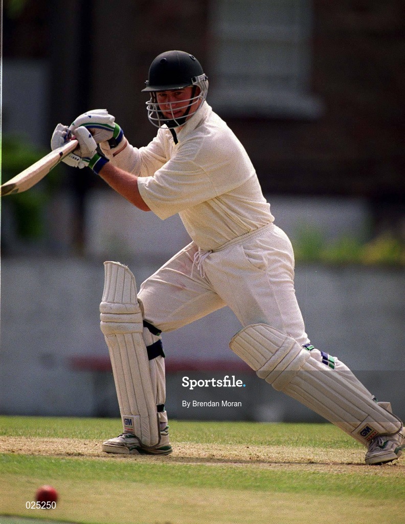 30 June 1999; Barry Archer of Ireland hits for a four during the Triple Crown Tournament match between Ireland and Wales at Leinster Cricket Club in Dublin. Photo by Brendan Moran/Sportsfile
