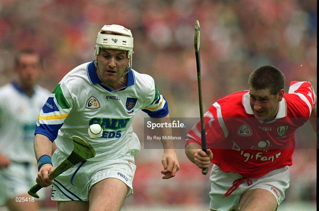 13 June 1999; Fergal Hartley of Waterford in action against Mark Landers of Cork during the Munster Senior Hurling Championship Semi-Final match between Cork and Waterford at Semple Stadium in Thurles, Tipperary. Photo by Ray McManus/Sportsfile