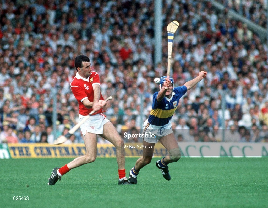 16 July 1990; Ger Fitzgerald of Cork in action against Conal Bonnar of Tipperary during the Munster Senior Hurling Championship Final match between Tipperary and Cork at Semple Stadium in Thurles, Tipperary. Photo by Ray McManus/Sportsfile