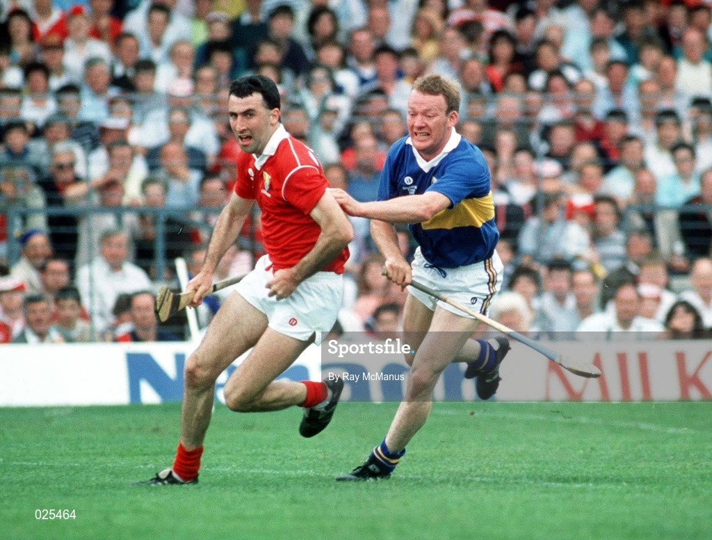 16 July 1990; Ger Fitzgerald of Cork in action against Bobby Ryan of Tipperary during the Munster Senior Hurling Championship Final match between Tipperary and Cork at Semple Stadium in Thurles, Tipperary. Photo by Ray McManus/Sportsfile