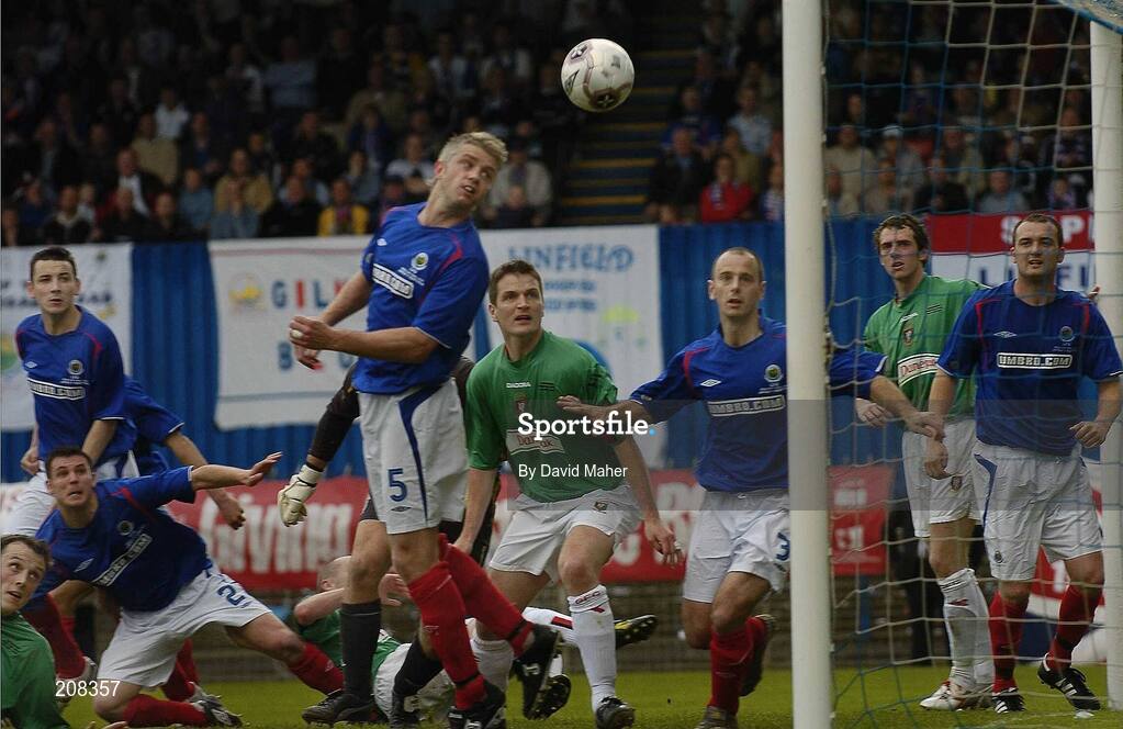 6 May 2006; Players from both Linfield and Glentoran look on as Michael Halliday, Glentoran, extreme left, scores his side's first goal. Nationwide Irish Cup final, Glentoran v Linfield, Windsor Park, Belfast. Picture credit: David Maher / SPORTSFILE