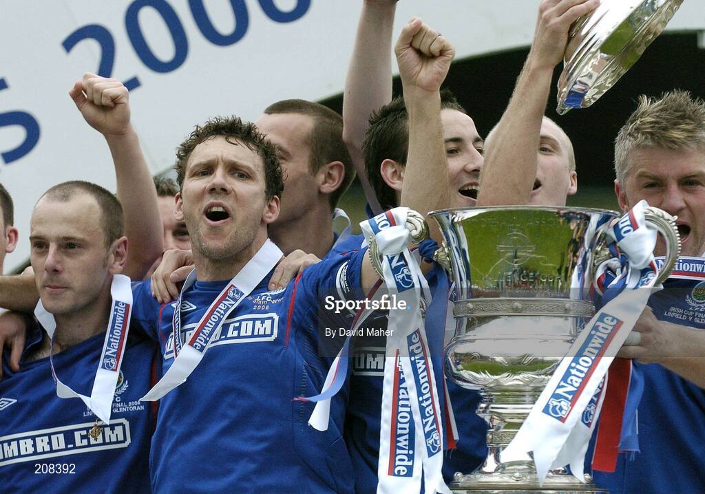 6 May 2006; Linfield players, left to right, Patrick McShane, Noel Bailie, captain, Michael Gault and William Murphy, celebrate at the end of the game. Nationwide Irish Cup final, Glentoran v Linfield, Windsor Park, Belfast. Picture credit: David Maher / SPORTSFILE