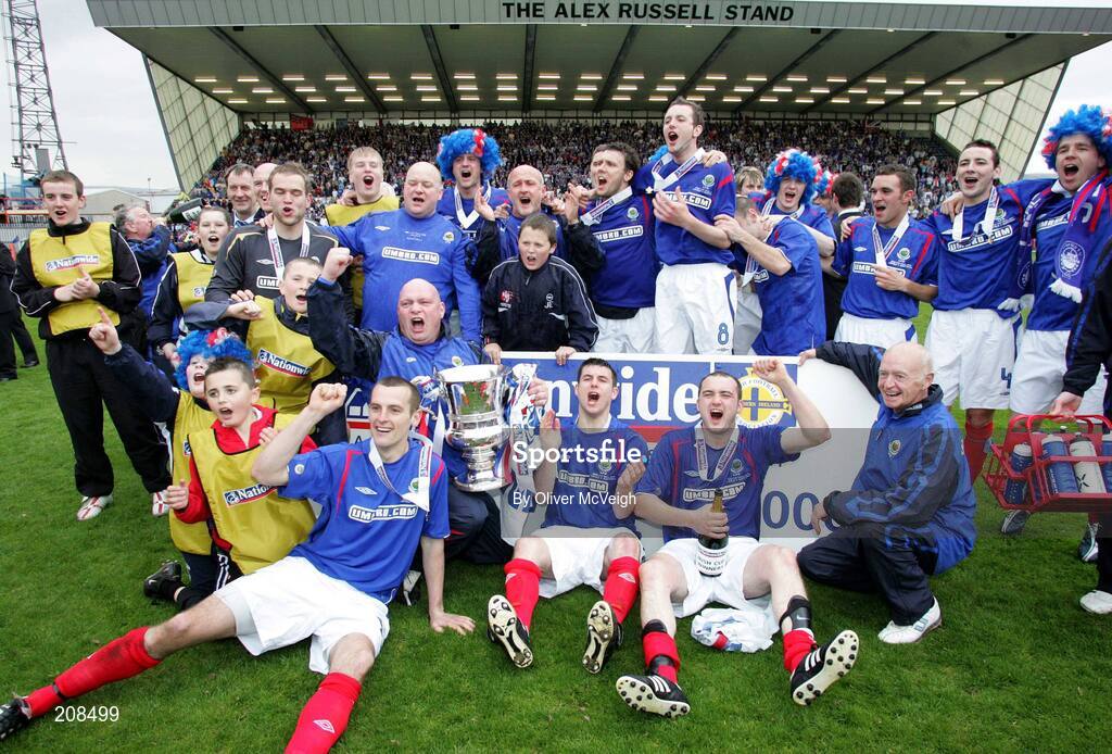 6 May 2006; The Linfield  team and officials celebrate with the Cup. Nationwide Irish Cup final, Glentoran v Linfield, Windsor Park, Belfast. Picture credit: Oliver McVeigh / SPORTSFILE