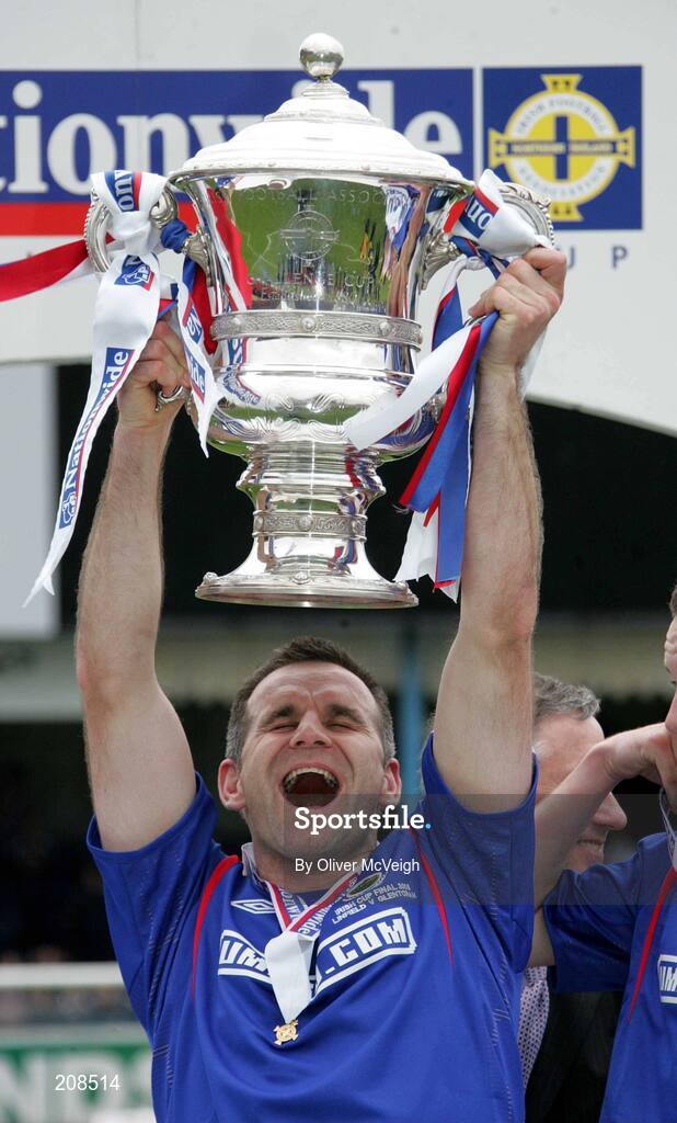 6 May 2006; Glenn Ferguson, Linfield's leading goal scorer for the season, lifts the cup. Nationwide Irish Cup final, Glentoran v Linfield, Windsor Park, Belfast. Picture credit: Oliver McVeigh / SPORTSFILE