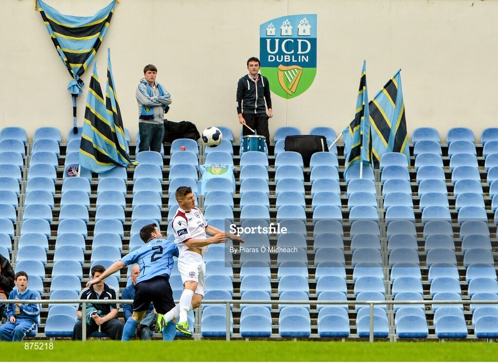 6 June 2014; UCD supporters look on as Colm Horgan, Galway, contests possession with Gareth Matthews, UCD. FAI Ford Cup, 2nd Round, UCD v Galway, UCD Bowl, Belfield, Dublin. Picture credit: Piaras Ó Mídheach / SPORTSFILE