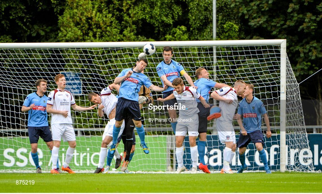 6 June 2014; Gareth Matthews, UCD, supported by team-mate Robbie Benson, right, clears from a corner. FAI Ford Cup, 2nd Round, UCD v Galway, UCD Bowl, Belfield, Dublin. Picture credit: Piaras Ó Mídheach / SPORTSFILE