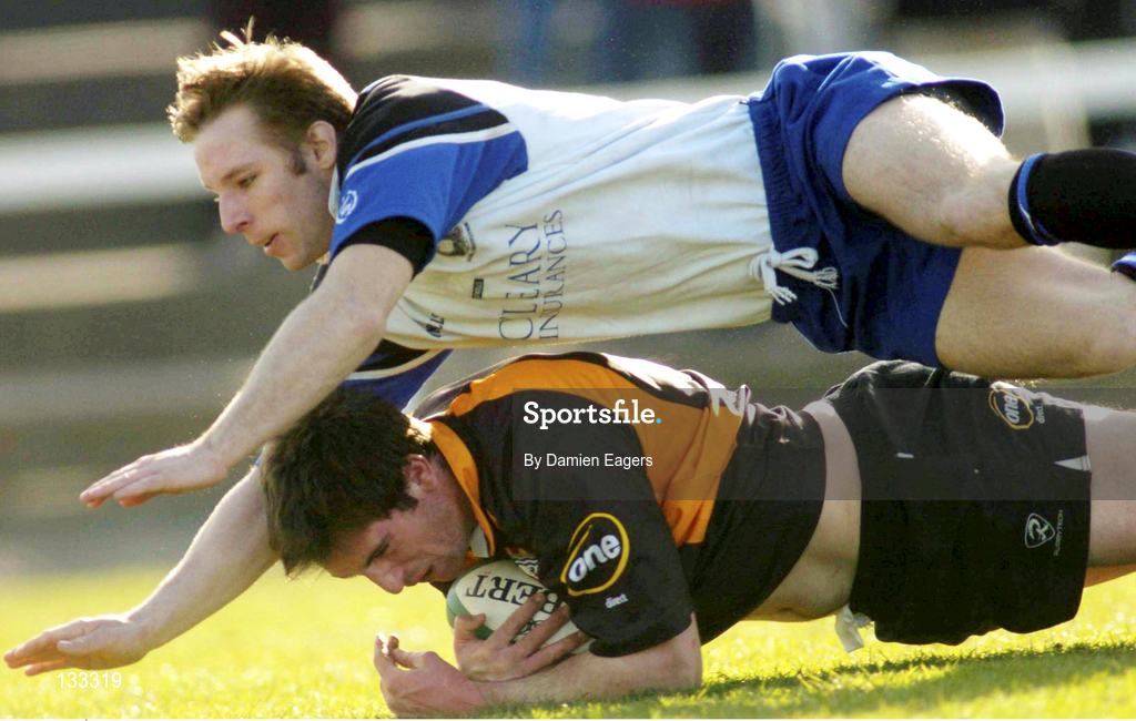28 February 2004; David Kelly of Buccaneers scores a try despite the tackle of Tomás O'Leary of Cork Constitution during the AIB All-Ireland League Division 1 match between Cork Constitution and Buccaneers at Temple Hill in Cork. Photo by Damien Eagers/Sportsfile