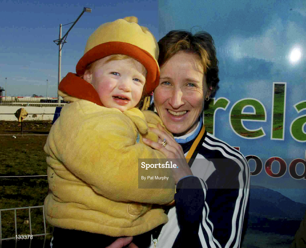 29 February 2004; Catherina McKiernan of Annalee AC, Cavan, with her daughter Deirbhile after she won the Open International women's race during the Rás na hÉireann at Dundalk racecourse in Dundalk, Louth. Photo by Pat Murphy/Sportsfile