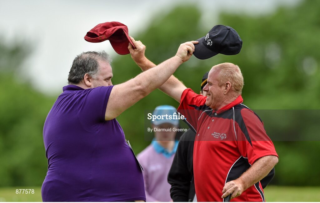 14 June 2014; Athlete Anthony McGrath, Kilmedan, Co. Waterford, Team Munster, swaps hats following the Short Putt event with volunteer David Rofe, Newmarket-on-Fergus, Co. Clare. Special Olympics Ireland Games, Ballykisteen Hotel & Golf Resort, Co. Tipperary. Picture credit: Diarmuid Greene / SPORTSFILE