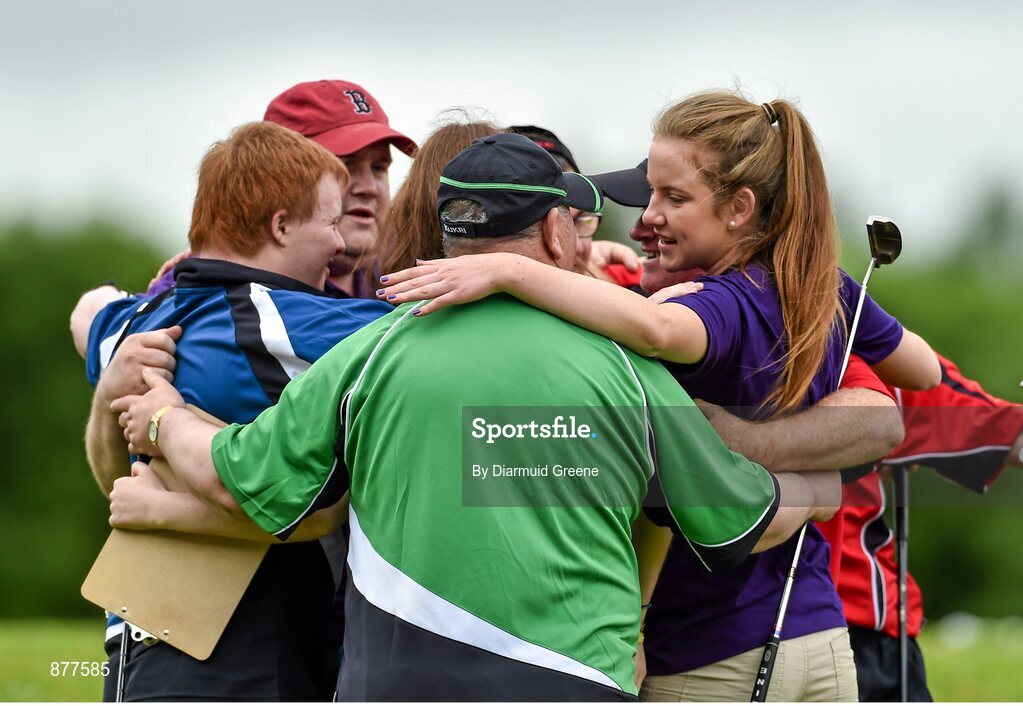14 June 2014; Athletes and volunteers share a group hug following the Short Putt event. Special Olympics Ireland Games, Ballykisteen Hotel & Golf Resort, Co. Tipperary. Picture credit: Diarmuid Greene / SPORTSFILE
