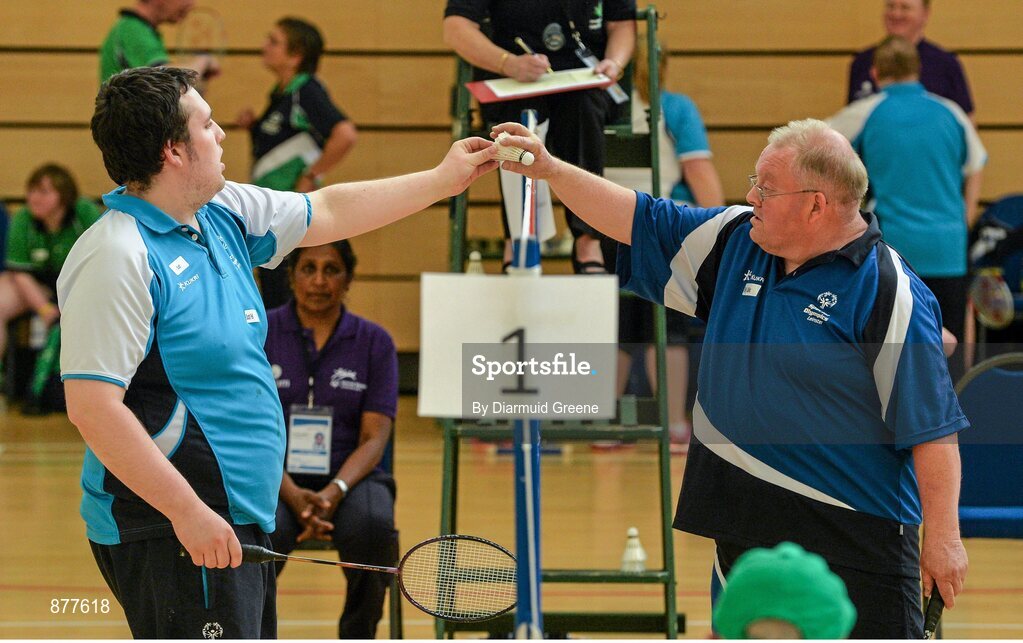 14 June 2014; Billy Collins, Monasterevin, Co. Kildare, Team Leinster, right, hands the shuttlecock to Scott Fell, Bray, Co. Wicklow, Eastern Region, during their Division 8 Badminton match. Special Olympics Ireland Games, Mary Immaculate College, Limerick.  Picture credit: Diarmuid Greene / SPORTSFILE