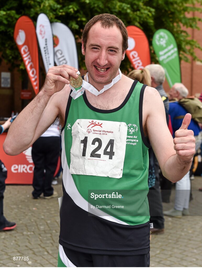 14 June 2014; Team Connaught athlete Tony Lynagh, from Sligo, celebrates with his gold medal after winning the Mens 800m walk. Special Olympics Ireland Games, University of Limerick, Limerick. Picture credit: Diarmuid Greene / SPORTSFILE