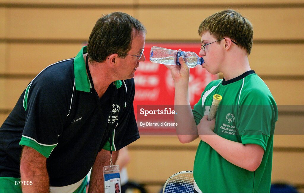 14 June 2014; Badminton athlete Liam Foley, Moate, Co. Westmeath, gets some advice from his coach Tommy Hehir, from Craughwell, Co. Galway, during half-time of his Division 8 game. Special Olympics Ireland Games, Mary Immaculate College, Limerick. Picture credit: Diarmuid Greene / SPORTSFILE