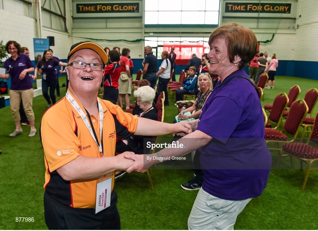 14 June 2014; Bocce bronze medalist Gary Carr, East Belfast, Co. Antrim, Team Ulster, dances with volunteer Ann O'Sullivan, from Dooradoyle, Limerick, after his medal ceremony. Special Olympics Ireland Games, Delta Sports Dome, Limerick. Picture credit: Diarmuid Greene / SPORTSFILE