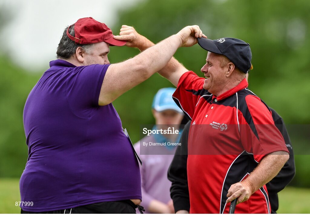 14 June 2014; Athlete Anthony McGrath, Kilmeadan, Co. Waterford, Team Munster, swaps hats following the Short Putt event with volunteer David Rofe, Newmarket-on-Fergus, Co. Clare. Special Olympics Ireland Games, Ballykisteen Hotel & Golf Resort, Co. Tipperary. Picture credit: Diarmuid Greene / SPORTSFILE