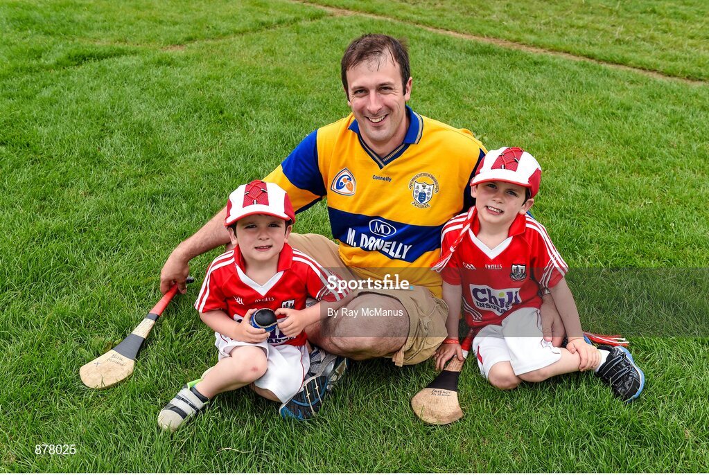 15 June 2014; Paul McMahon, from Kilmihill, Co. Clare, but resident now with his two sons, Brian, four years, and Daragh, 6, in Leamlara, Co. Cork, relax before the game. Munster GAA Hurling Senior Championship, Semi-Final, Clare v Cork, Semple Stadium, Thurles, Co. Tipperary. Picture credit: Ray McManus / SPORTSFILE
