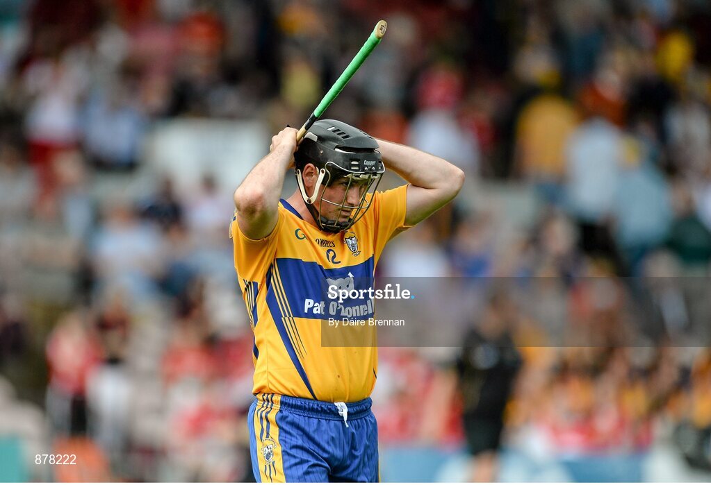 15 June 2014; A dejected Colin Ryan, Clare, leaves the field after the game. Munster GAA Hurling Senior Championship, Semi-Final, Clare v Cork, Semple Stadium, Thurles, Co. Tipperary. Picture credit: Dáire Brennan / SPORTSFILE