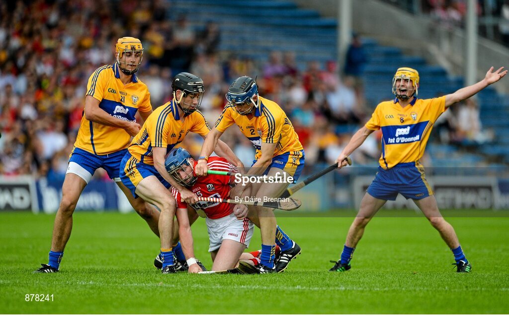 15 June 2014; Patrick Horgan, Cork, in action against Clare players, left to right, Peter Duggan, Patrick Donnellan, David McInerney and Colm Galvin. Munster GAA Hurling Senior Championship, Semi-Final, Clare v Cork, Semple Stadium, Thurles, Co. Tipperary. Picture credit: Dáire Brennan / SPORTSFILE
