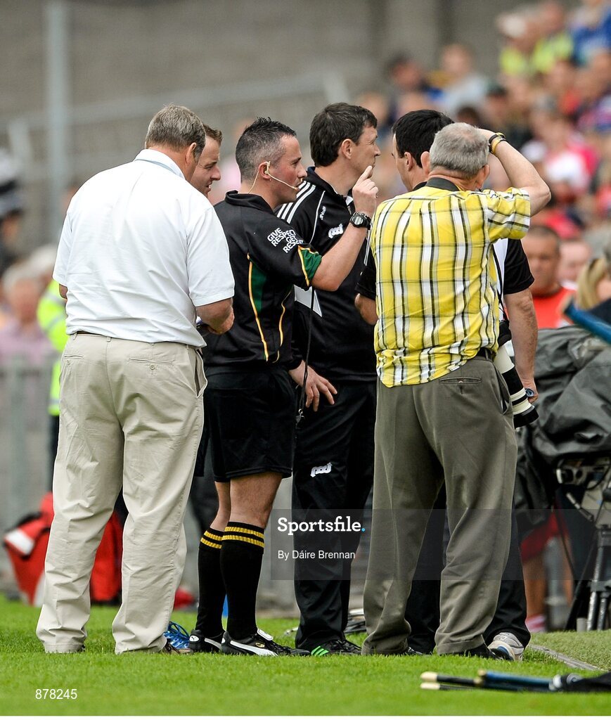 15 June 2014; Referee James McGrath cautions Clare selector Mike Deegan at the start of the second half over an incident that took place as the players were leaving the field at half time. Munster GAA Hurling Senior Championship, Semi-Final, Clare v Cork, Semple Stadium, Thurles, Co. Tipperary. Picture credit: Dáire Brennan / SPORTSFILE