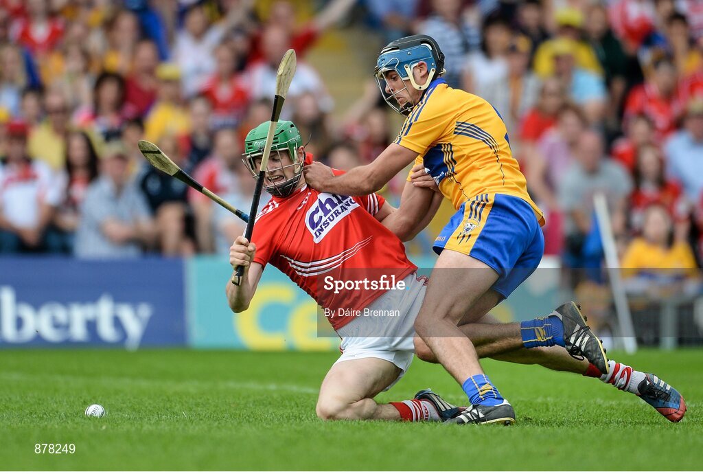 15 June 2014; Seamus Harnedy, Cork, is fouled by Brendan Bugler, Clare, which resulted in a penalty being awarded to Cork. Munster GAA Hurling Senior Championship, Semi-Final, Clare v Cork, Semple Stadium, Thurles, Co. Tipperary. Picture credit: Dáire Brennan / SPORTSFILE