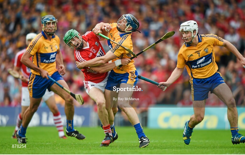 15 June 2014; Seamus Harnedy, Cork, is tackled by David McInerney, Clare. Munster GAA Hurling Senior Championship, Semi-Final, Clare v Cork, Semple Stadium, Thurles, Co. Tipperary. Picture credit: Ray McManus / SPORTSFILE