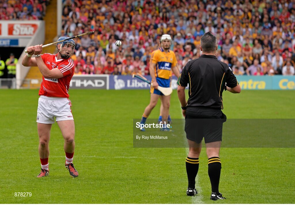 15 June 2014; Referee James McGrath watches as  Patrick Horgan, who scored 2-11 from placed balls for Cork, takes a 21 meter free. Munster GAA Hurling Senior Championship, Semi-Final, Clare v Cork, Semple Stadium, Thurles, Co. Tipperary. Picture credit: Ray McManus / SPORTSFILE