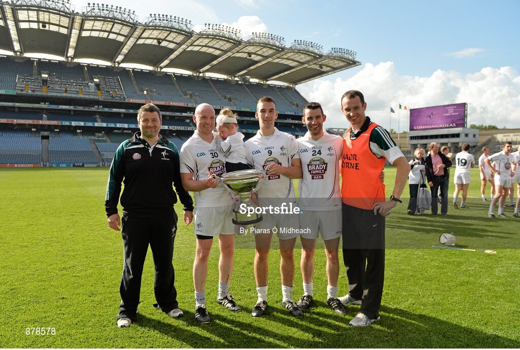 7 June 2014; Kildare backroom staff, Dermot Coulston, left, statsman and Tom O'Meara, selector, right, with players, Richie Hoban, with his daughter Lucy, Martin Fitzgerald, Peter Coleman, all from Ardclough GAA club. Christy Ring Cup Final, Kerry v Kildare, Croke Park, Dublin. Picture credit: Piaras Ó Mídheach / SPORTSFILE