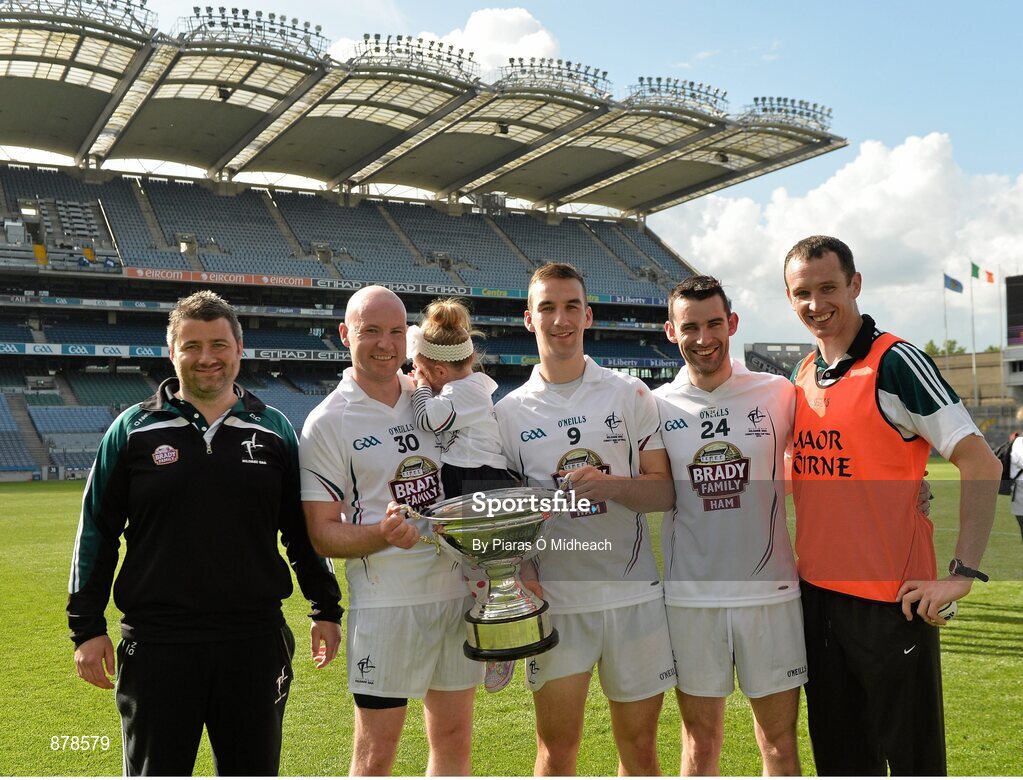 7 June 2014; Kildare backroom staff, Dermot Coulston, left, statsman, and Tom O'Meara, selector, right, with players, Richie Hoban, with his daughter Lucy, Martin Fitzgerald, Peter Coleman, all from Ardclough GAA club. Christy Ring Cup Final, Kerry v Kildare, Croke Park, Dublin. Picture credit: Piaras Ó Mídheach / SPORTSFILE