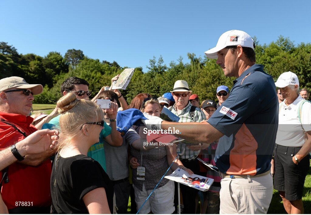 18 June 2014; Padraig Harrington signs autographs for fans during the 2014 Irish Open Golf Championship Pro-Am. Fota Island, Cork. Picture credit: Matt Browne / SPORTSFILE