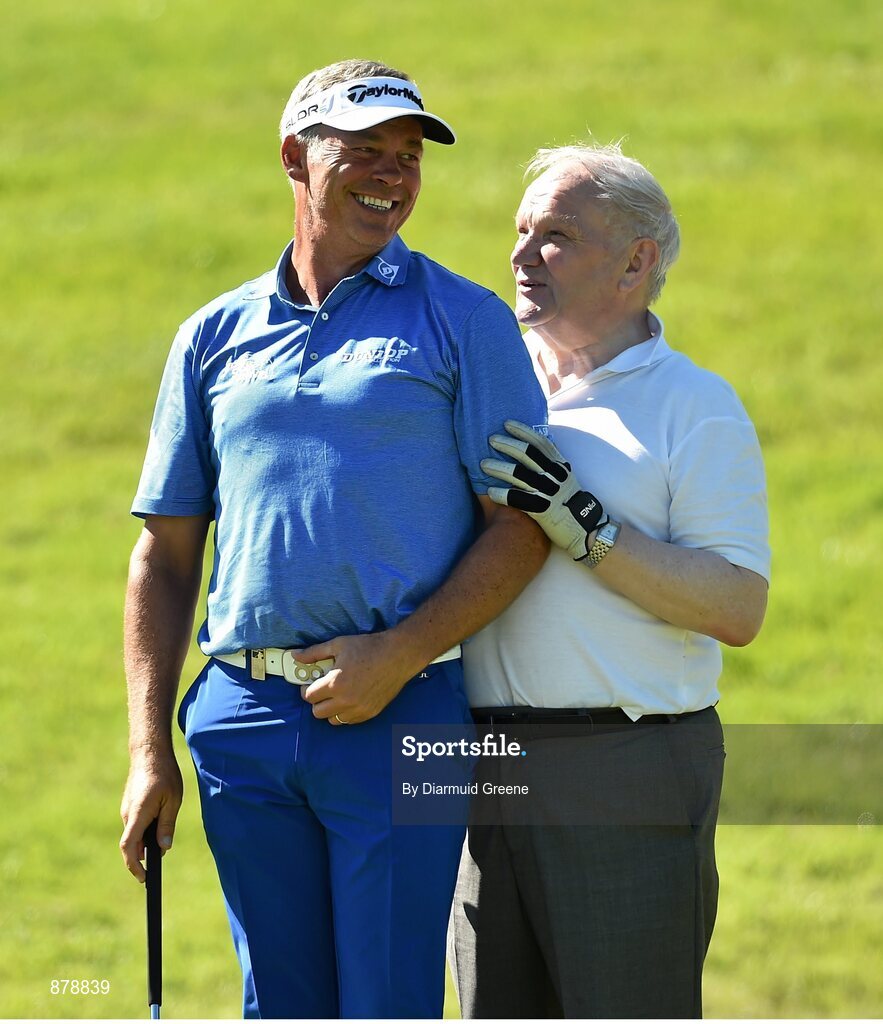 18 June 2014; Darren Clarke shares a joke with Jack Wall, from Athy Golf Club, Co. Kildare, on the thirteenth green during the 2014 Irish Open Golf Championship Pro-Am. Fota Island, Cork. Picture credit: Diarmuid Greene / SPORTSFILE